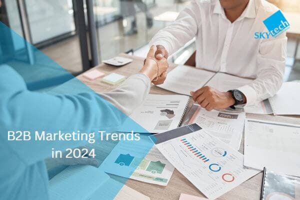 two man shaking hand in a office, b2b marketing trends